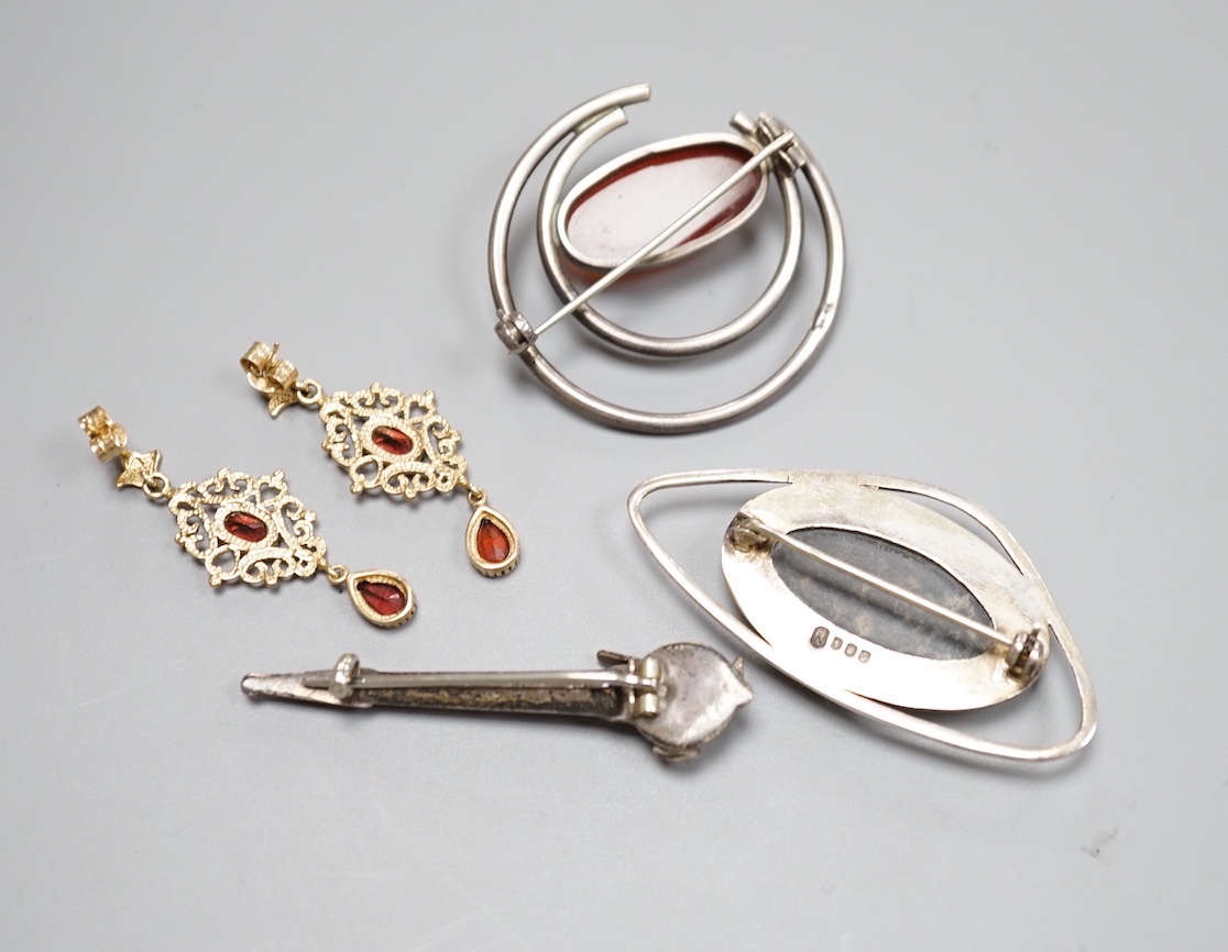 A modern pair of 9ct and gem set drop earrings and three white metal gem set brooches, including one silver and one set with Scottish hardstones.